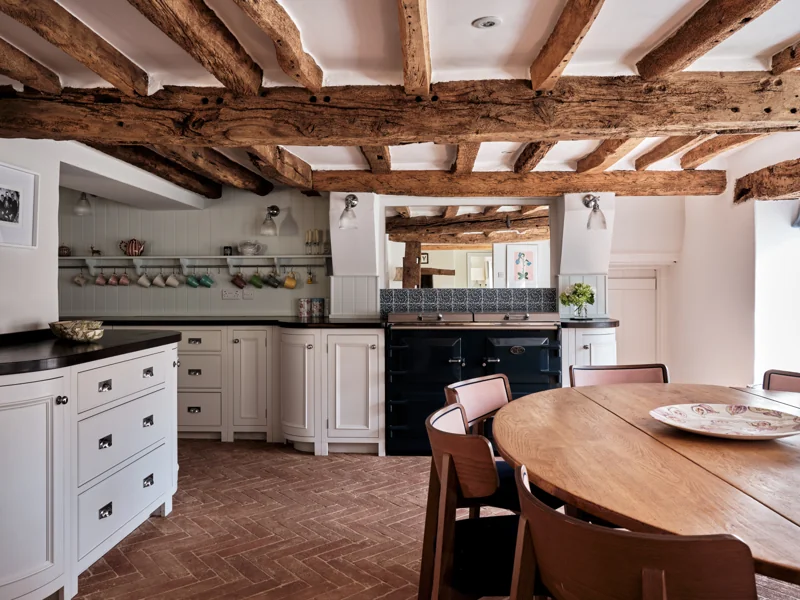 Traditional kitchen beneath exposed timber beams